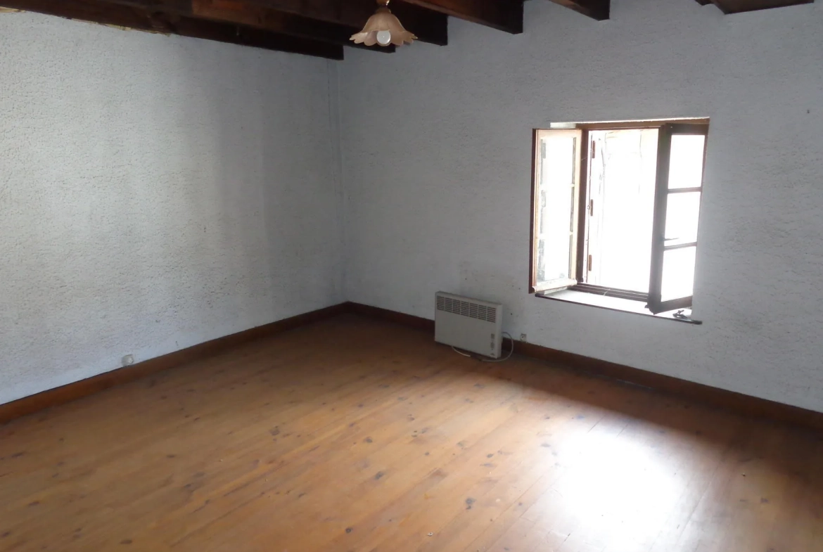 Maison à rénover avec terrain à Grandris - Investissement idéal 