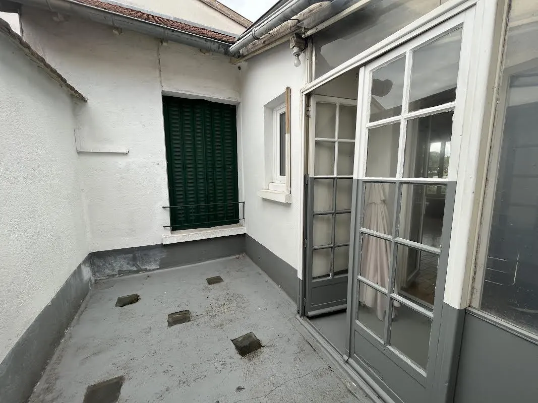 Maison de ville à Roanne - 90 m², garage, terrasse, potentiel commercial 