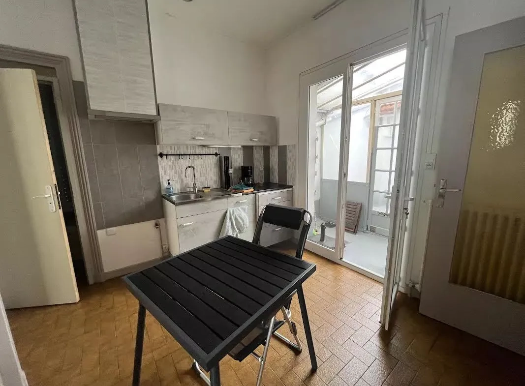 Maison de ville avec terrasse et garage au centre de Roanne 