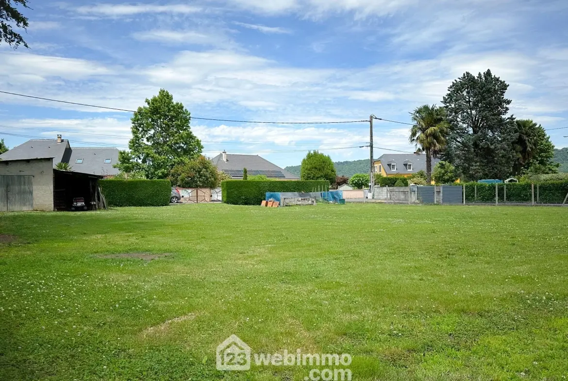 Terrain à bâtir de 1200 m² à Bœil-Bezing - Cadre paisible et proche des axes 
