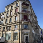 Appartement lumineux de 138 m² en centre-ville d'Épinal avec balcon et cave
