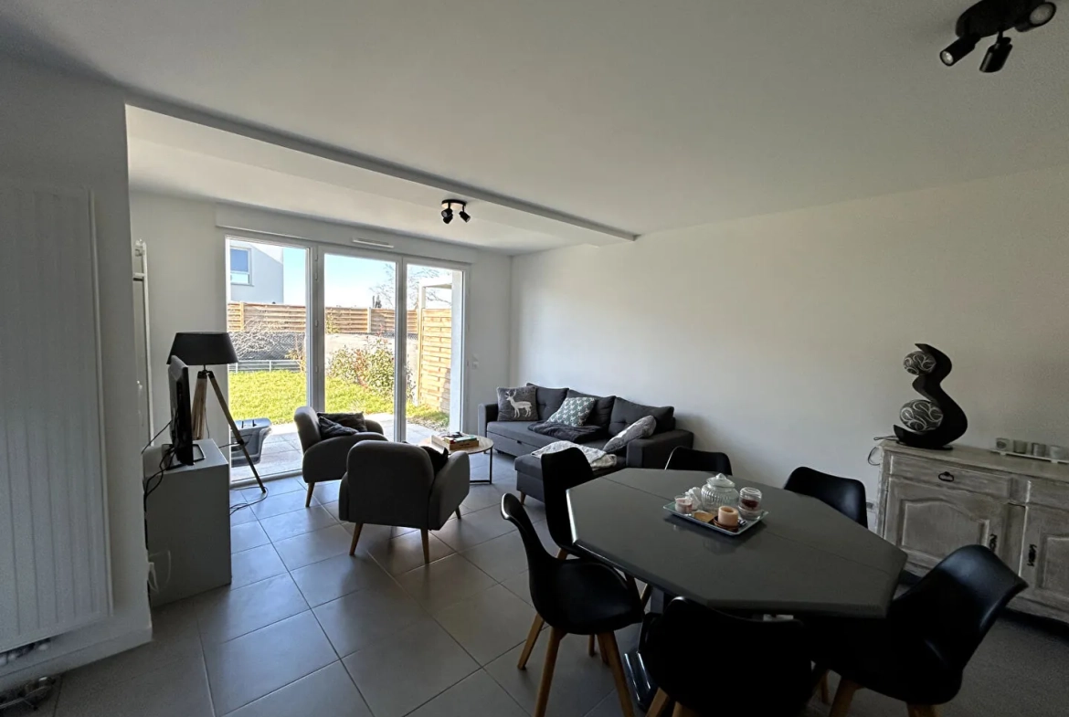 Maison récente à Bonson avec 4 chambres, terrasse et faibles dépenses énergétiques 