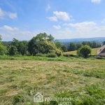 Terrain constructible de 1600 m² à Nay avec vue dégagée
