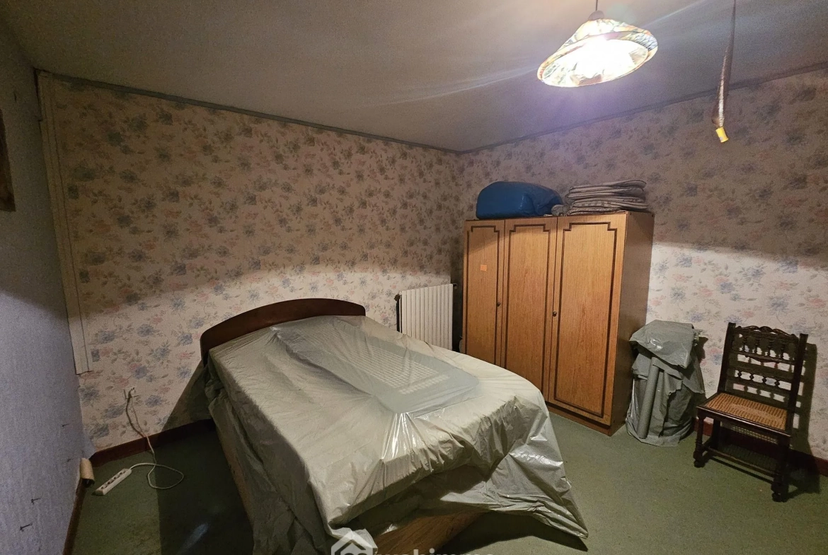 Longère en briques et ardoises avec 2 chambres, garage et véranda près de Noyon 