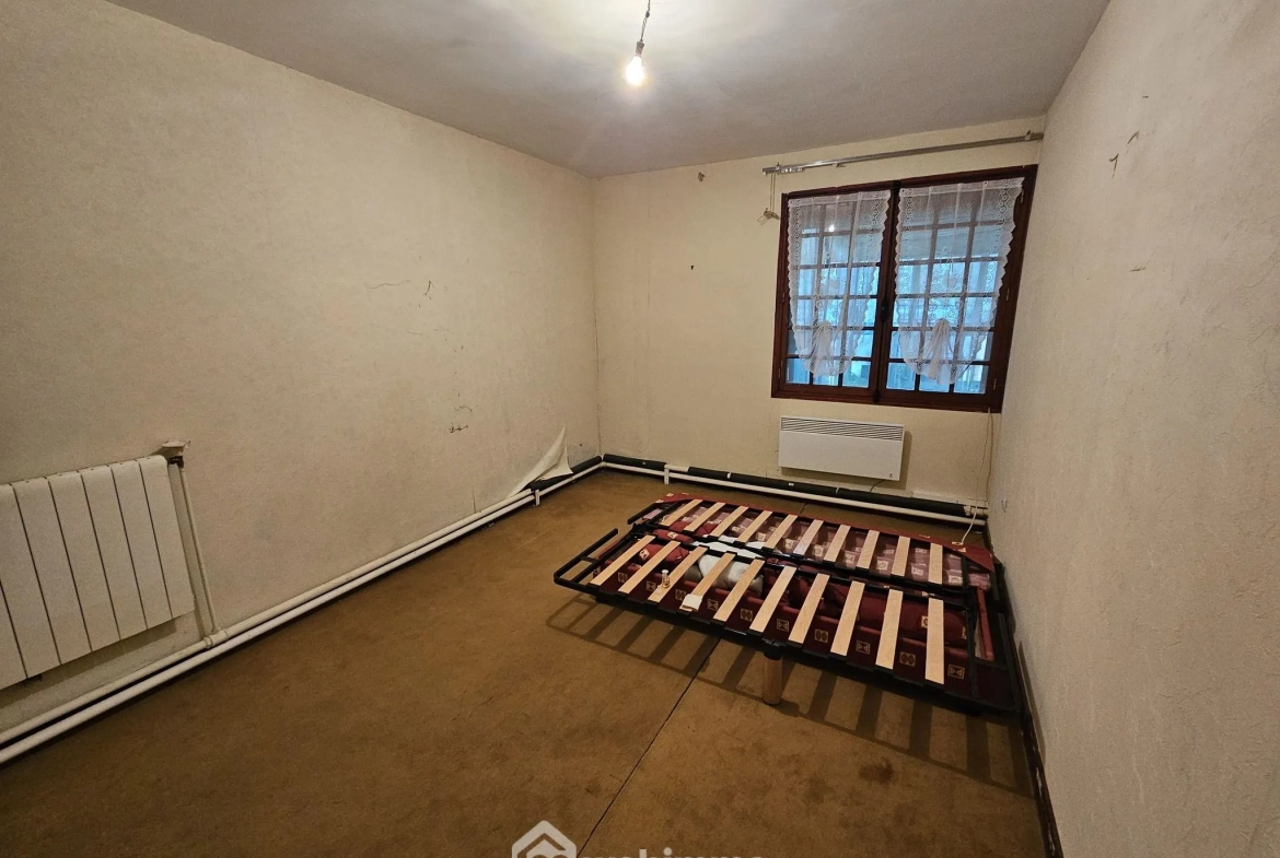 Longère en briques et ardoises avec 2 chambres, garage et véranda près de Noyon 