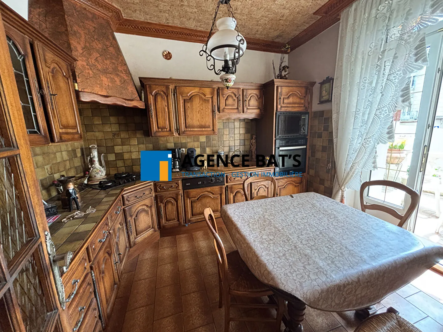 Maison à vendre en centre-ville d'Unieux avec garage, cheminée et revenu photovoltaïque 