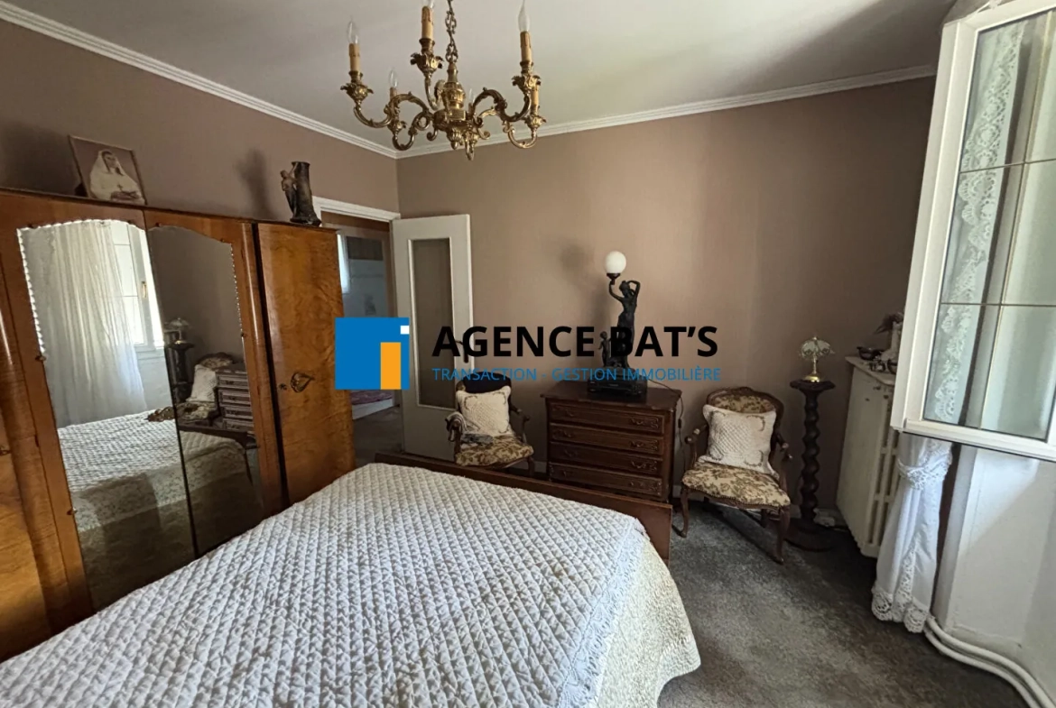 Maison à vendre en centre-ville d'Unieux avec garage, cheminée et revenu photovoltaïque 