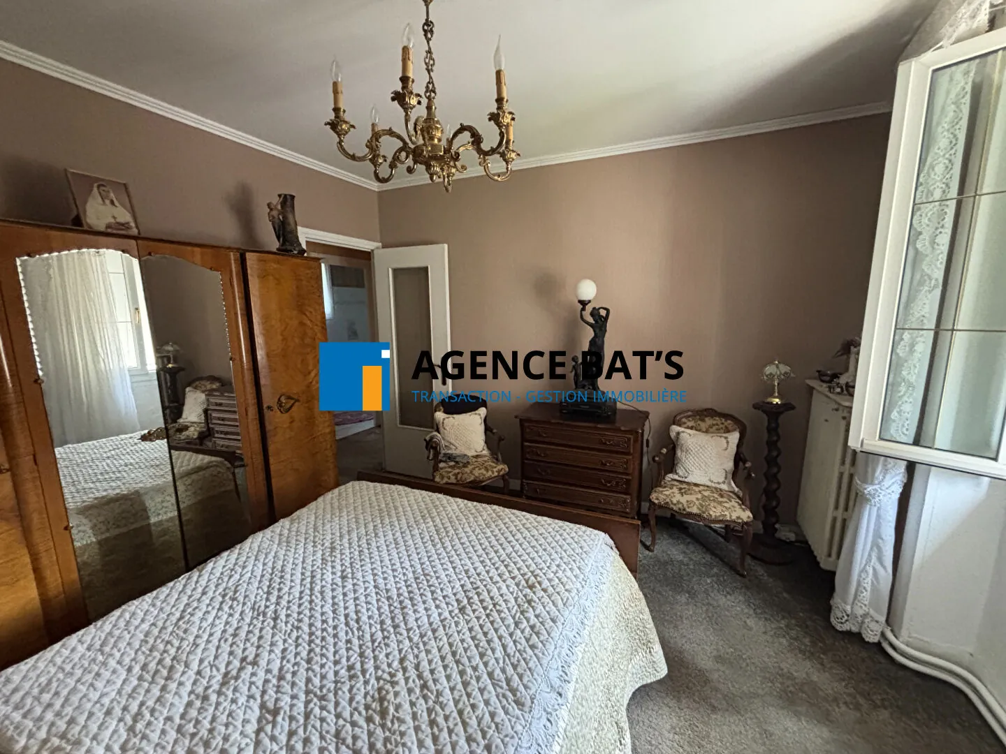 Maison à vendre en centre-ville d'Unieux avec garage, cheminée et revenu photovoltaïque 