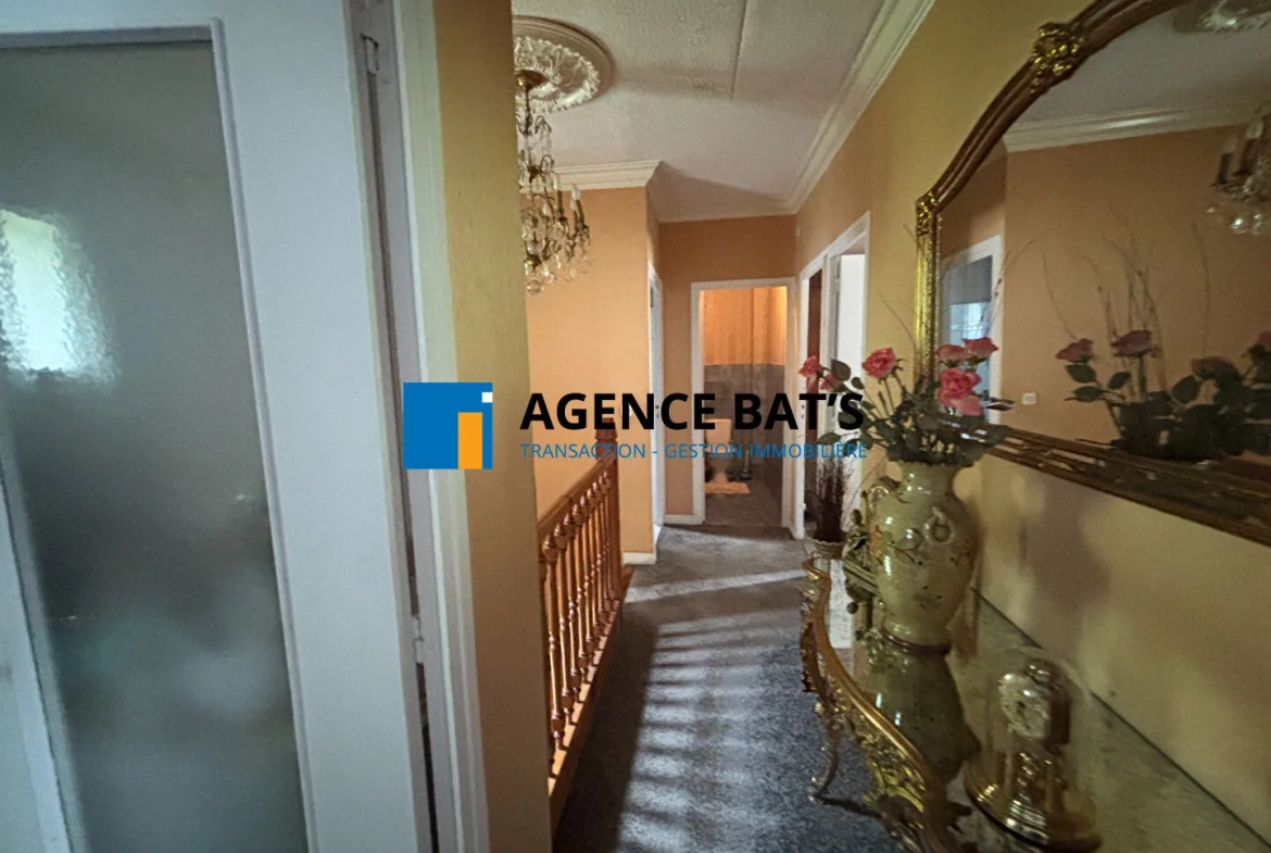 Maison à vendre en centre-ville d'Unieux avec garage, cheminée et revenu photovoltaïque 