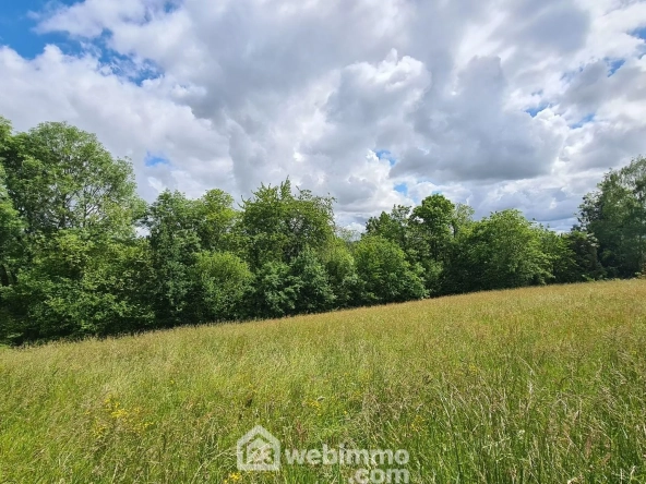 Terrain constructible de 2153 m² à Haut-de-Bosdarros, calme et proche des écoles