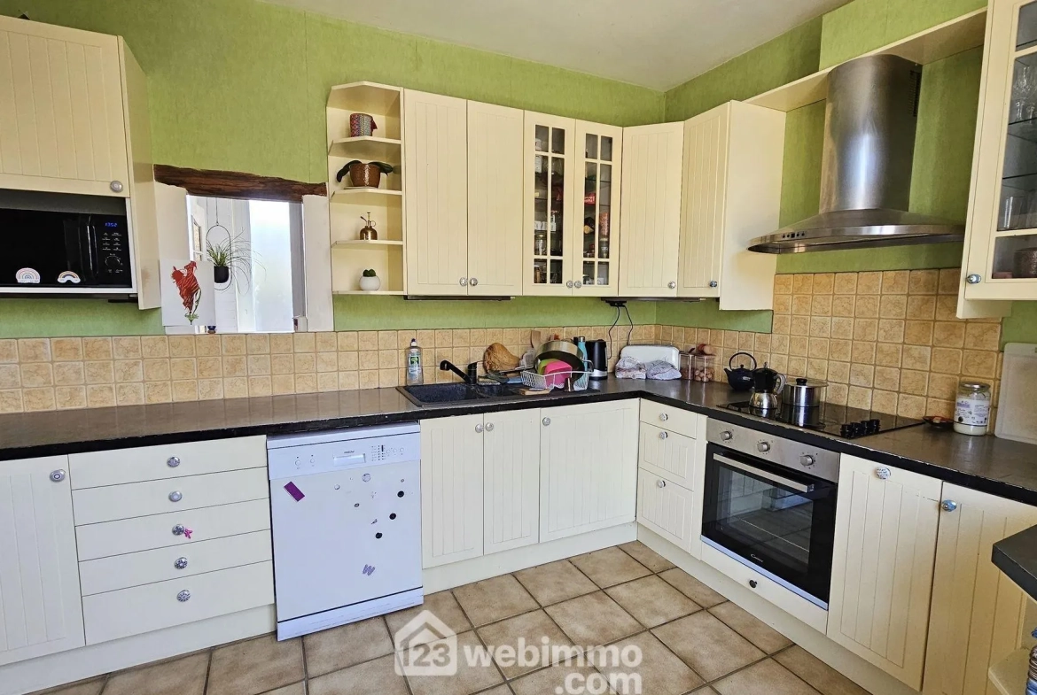 Maison en pierre de 120 m² à vendre à Boutigny-sur-Essonne avec garage et jardin 