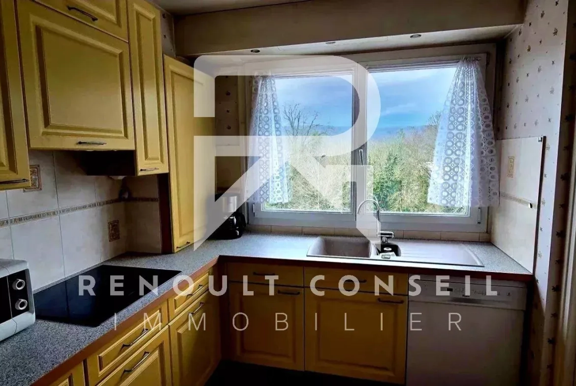 Appartement F3 avec balcon et garages à Saint-Aubin-lès-Elbeuf 