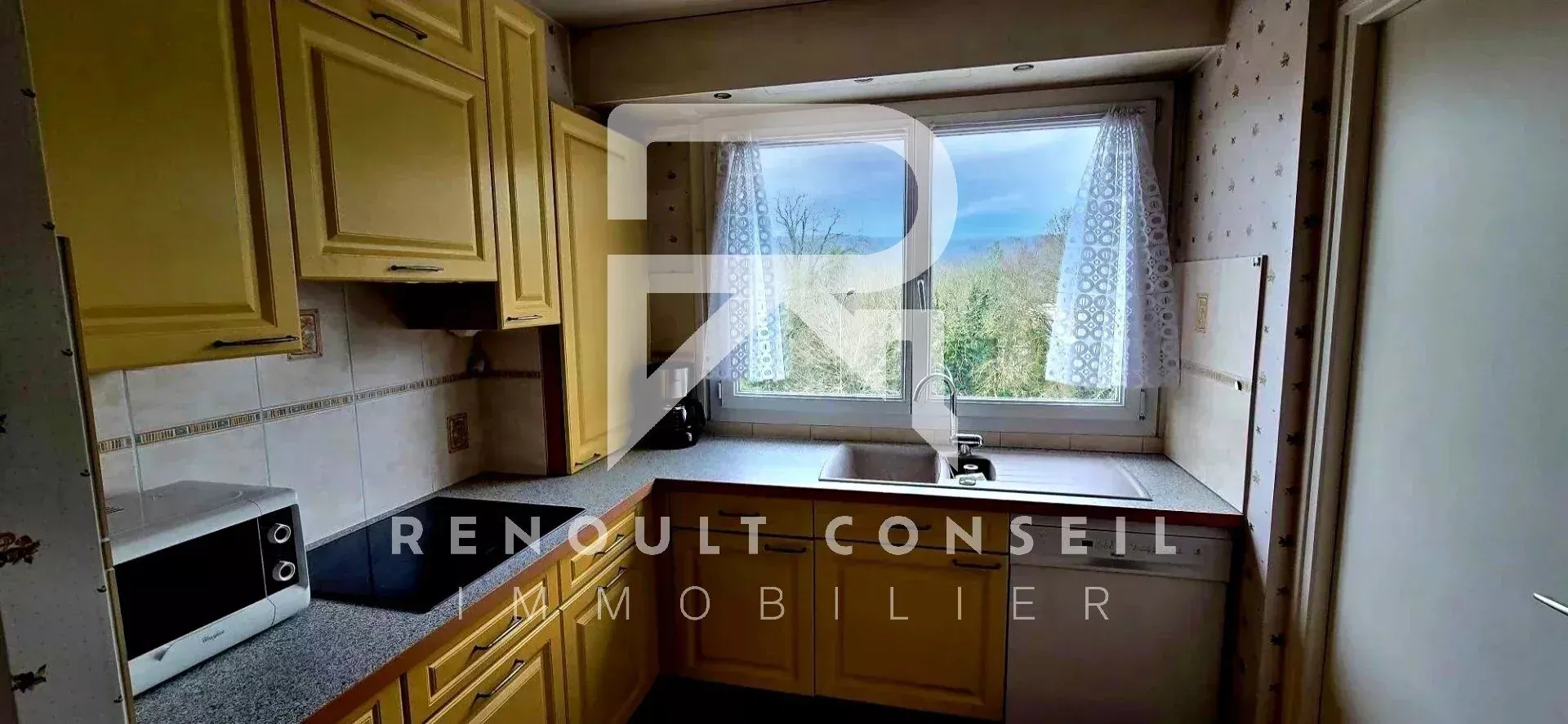 Appartement F3 avec balcon et garages à Saint-Aubin-lès-Elbeuf 