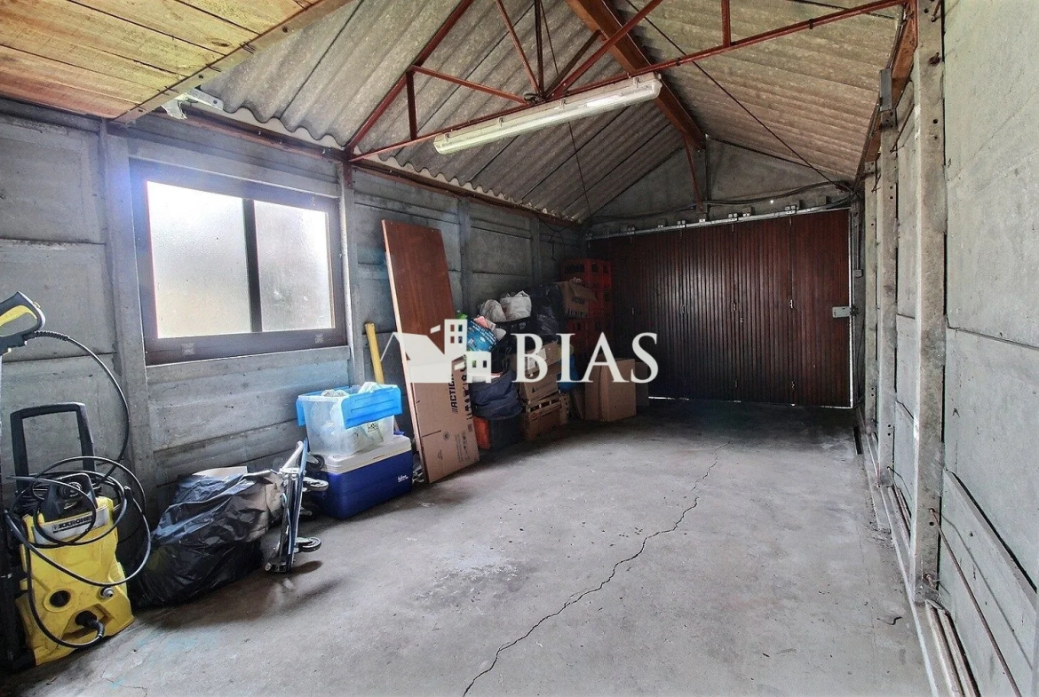 Maison normande à Bourg-Achard avec garage et terrain 340 m² 