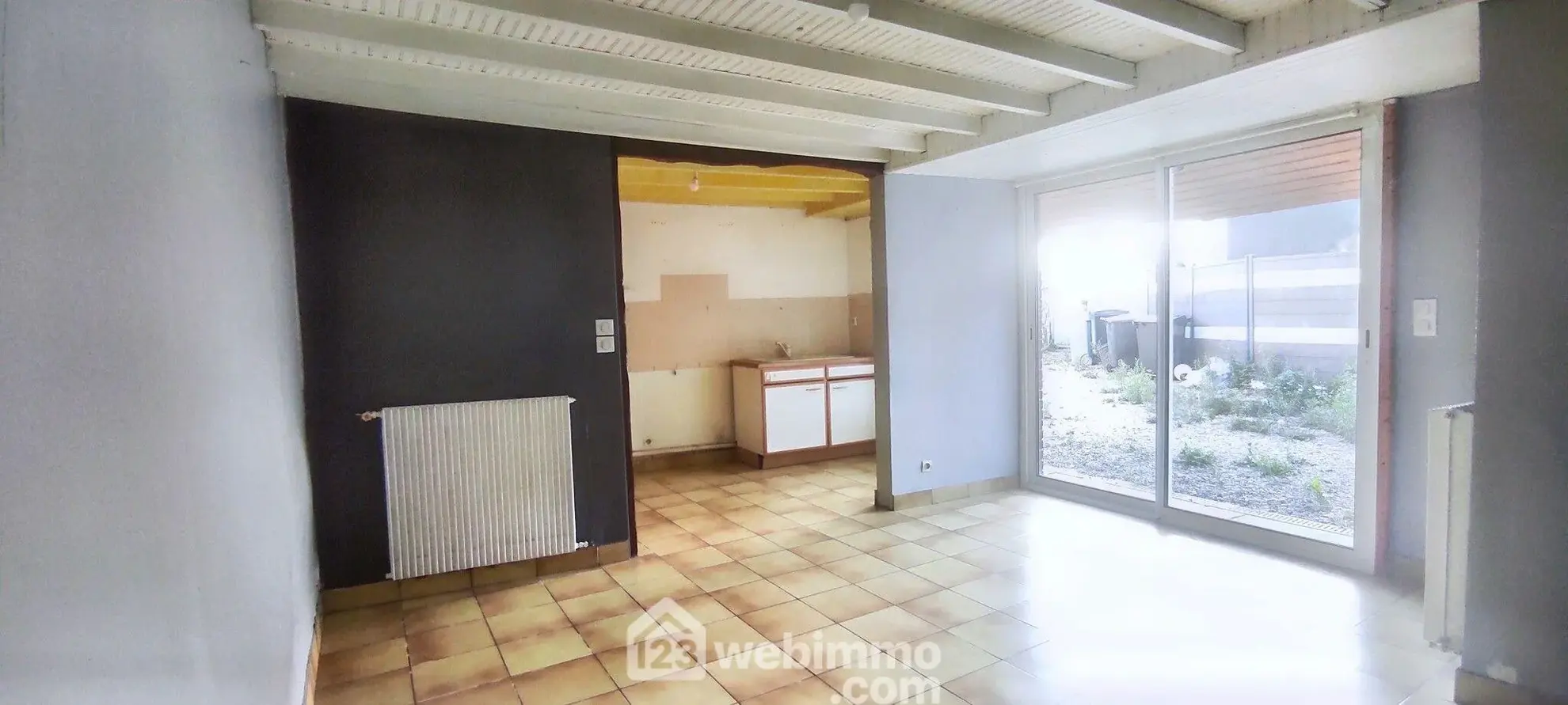 Maison à Incarville de 86m² avec jardin clos et potentiel, à rafraîchir 