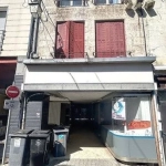 Immeuble à vendre en centre-ville de Chaumont avec local commercial et appartements à rénover
