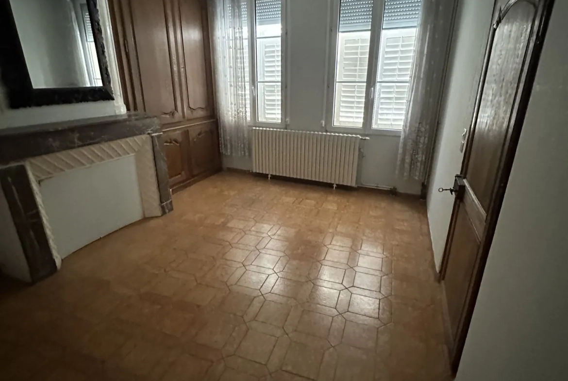 Maison de ville avec cave voûtée et garage à Bar-le-Duc - Investissement ou résidence 