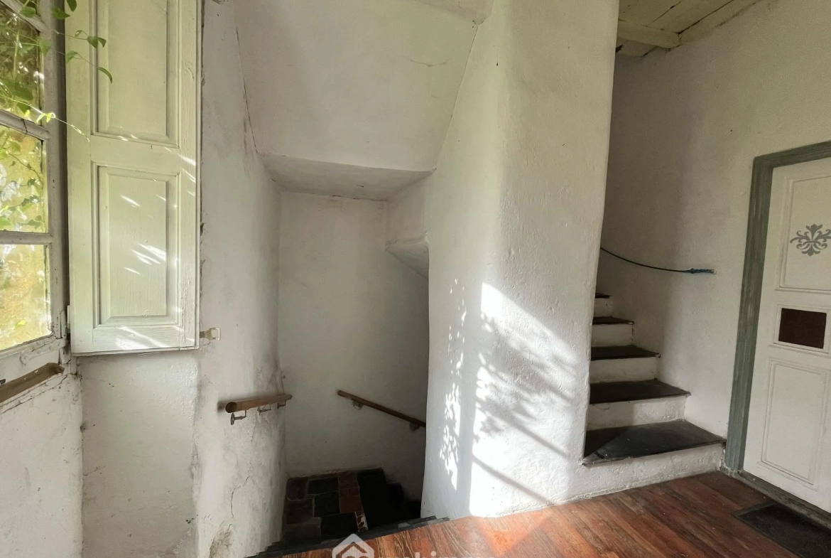 Appartement à rénover de 74 m² à Muro avec terrain et cave, potentiel d’agrandissement 