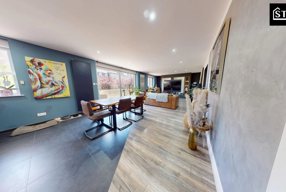 Appartement rénové de 90 m² au centre de Belfort avec balcon et parking 