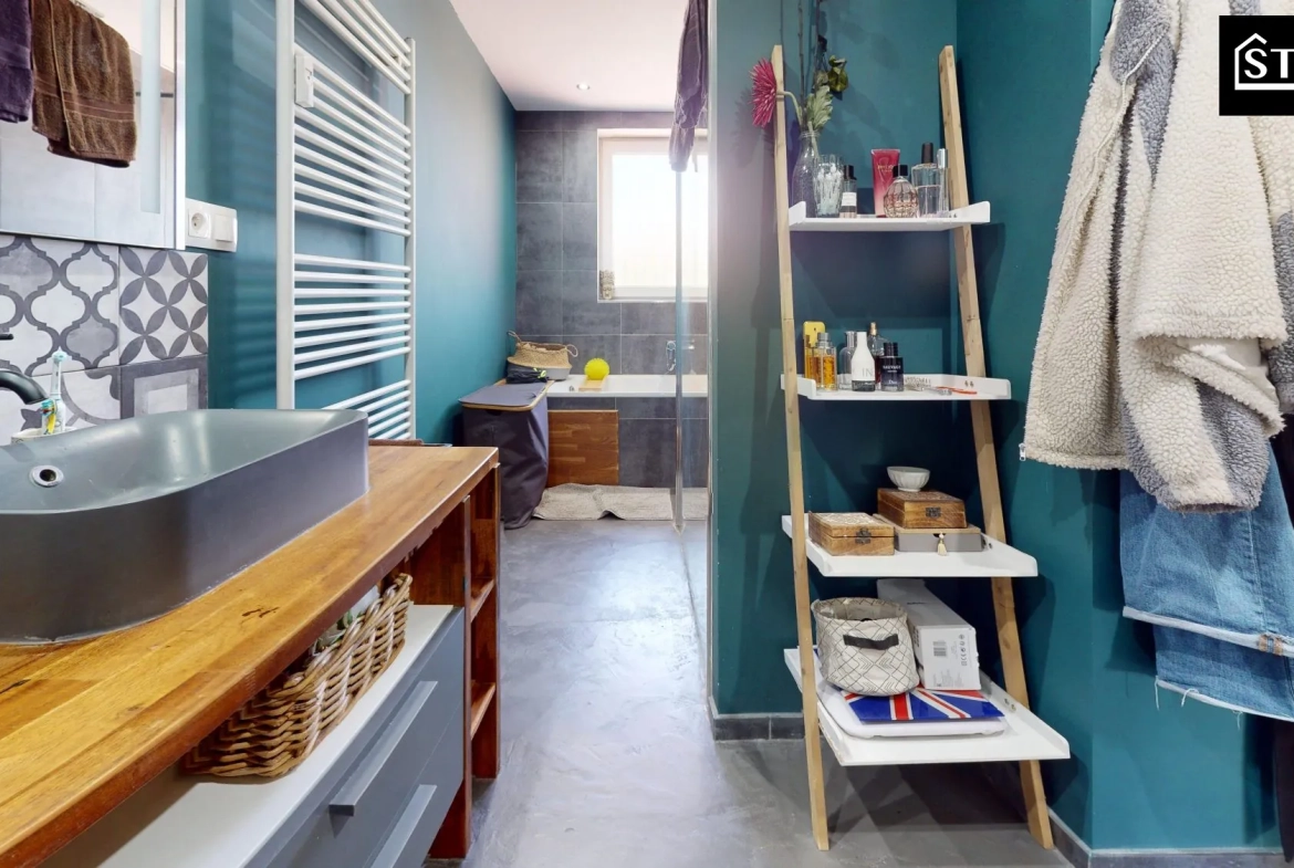 Appartement rénové de 90 m² au centre de Belfort avec balcon et parking 
