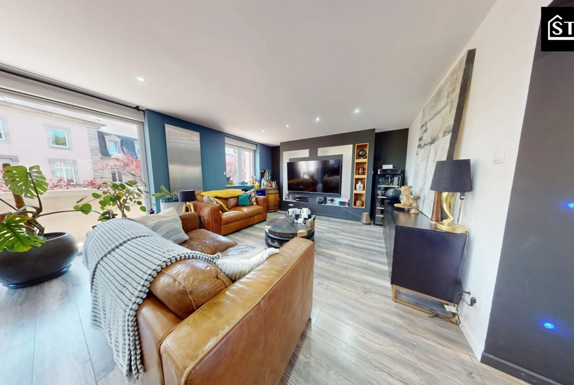 Appartement rénové de 90 m² au centre de Belfort avec balcon et parking 
