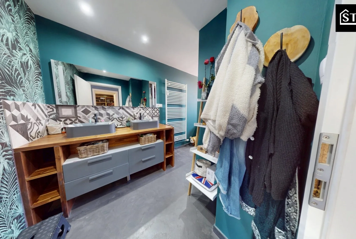 Appartement rénové de 90 m² au centre de Belfort avec balcon et parking 