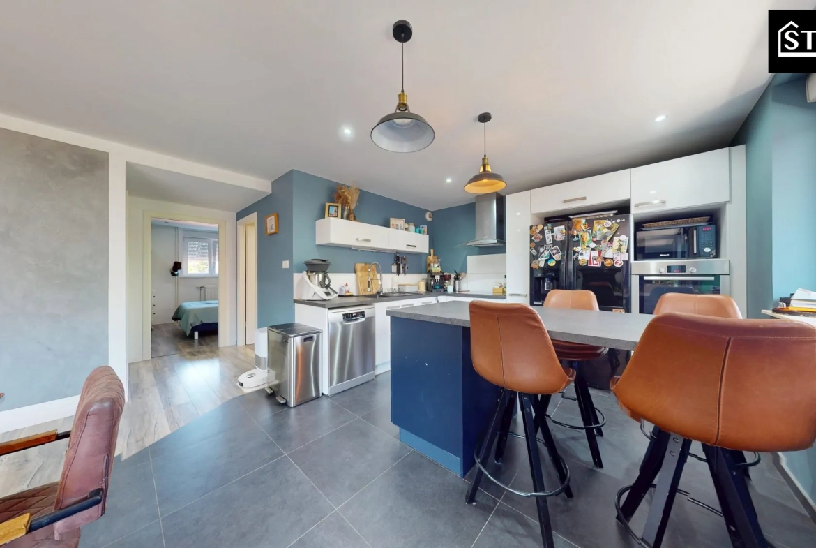 Appartement rénové de 90 m² au centre de Belfort avec balcon et parking 
