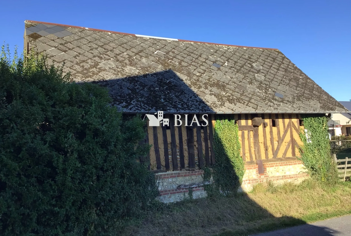 Terrain à bâtir de 941 m² à Épaignes avec bâtiment normand et réseaux en bordure 