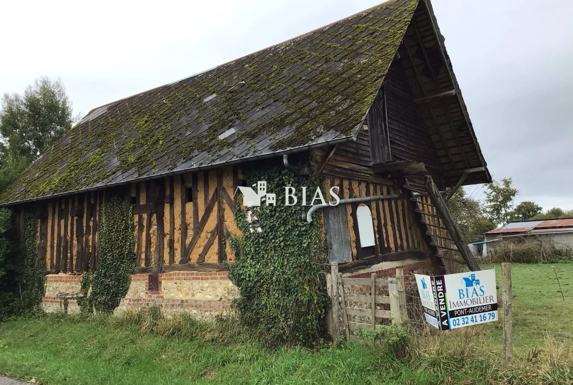 Terrain à bâtir de 941 m² à Épaignes avec bâtiment normand et réseaux en bordure 