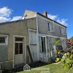Maison en pierre à rénover avec dépendances et terrain à Milly-la-Forêt