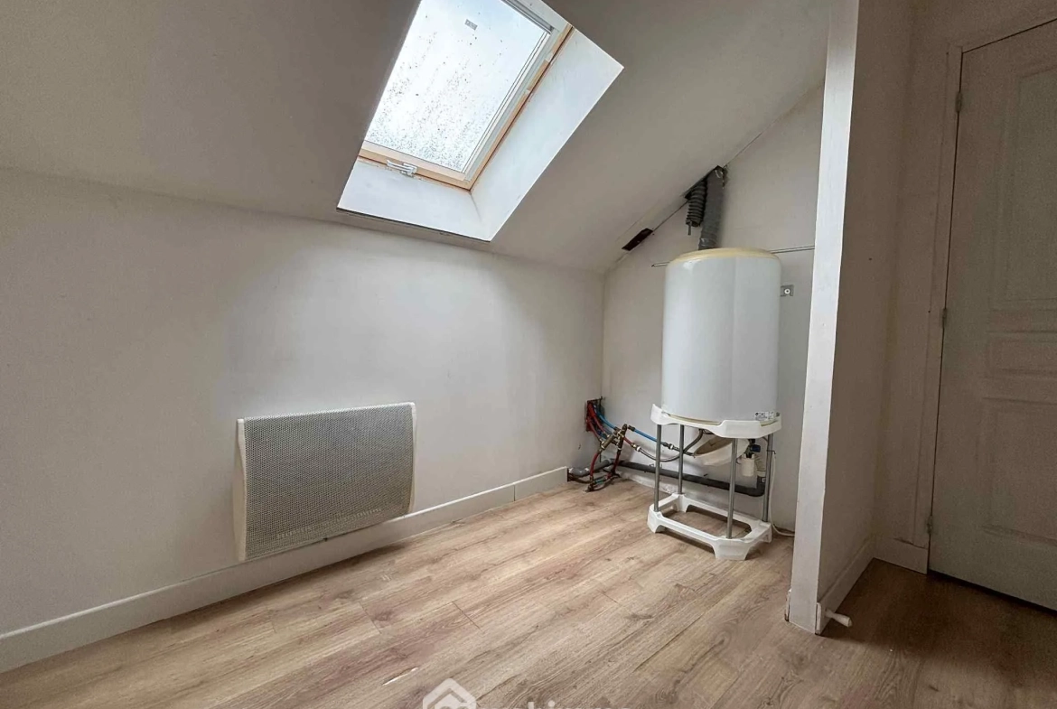 Maison en pierre à Les Ormes de 94m² avec jardin et dépendances 