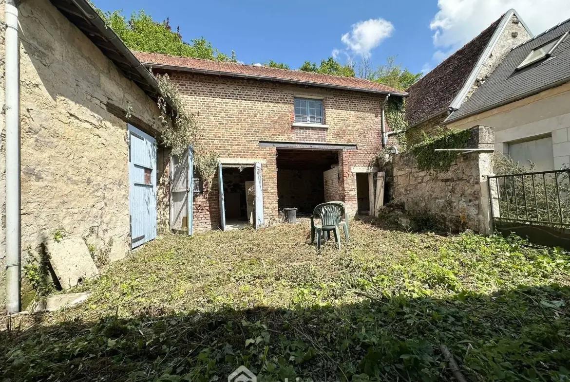 Ensemble immobilier avec maison et granges à Chéret - Potentiel exceptionnel 