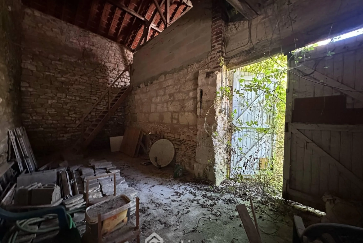 Ensemble immobilier avec maison et granges à Chéret - Potentiel exceptionnel 