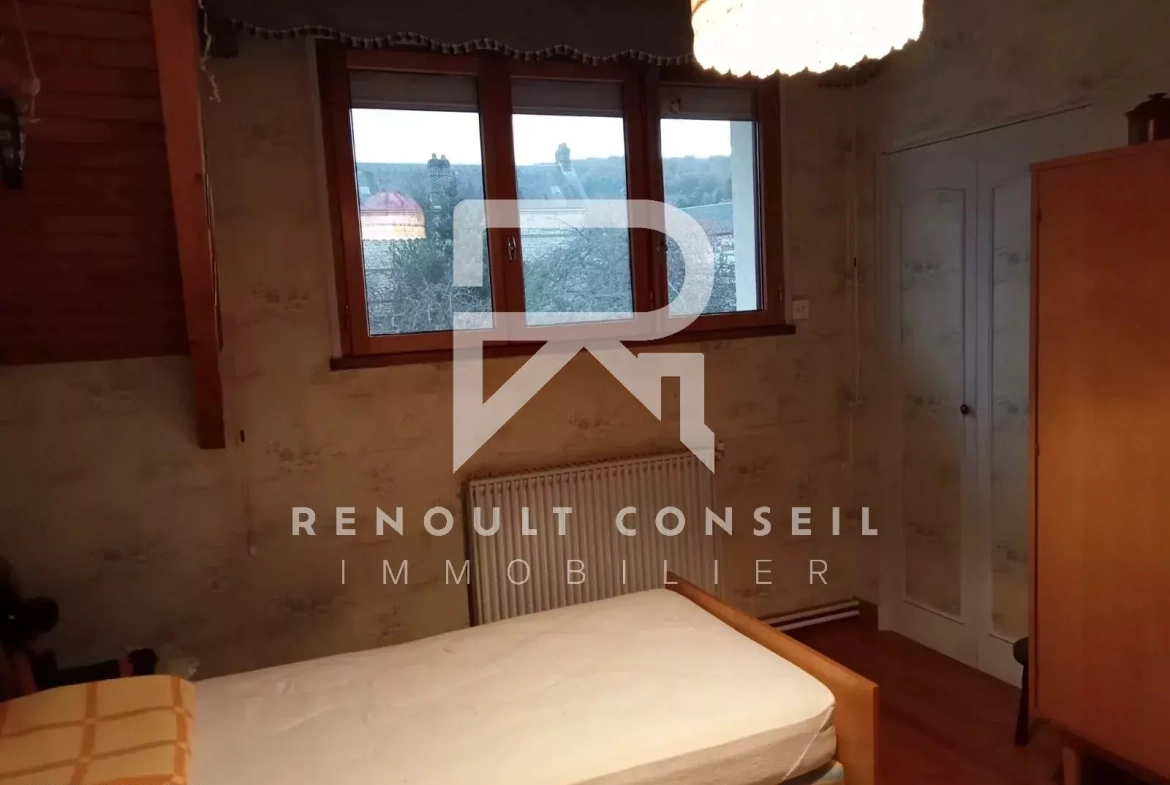 Charmante maison de ville de 115 m² à Caudebec-lès-Elbeuf avec jardin et garage 