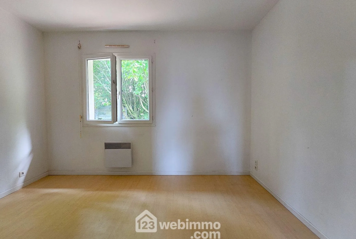 Maison de plain-pied à Narcastet avec grand jardin et garage 