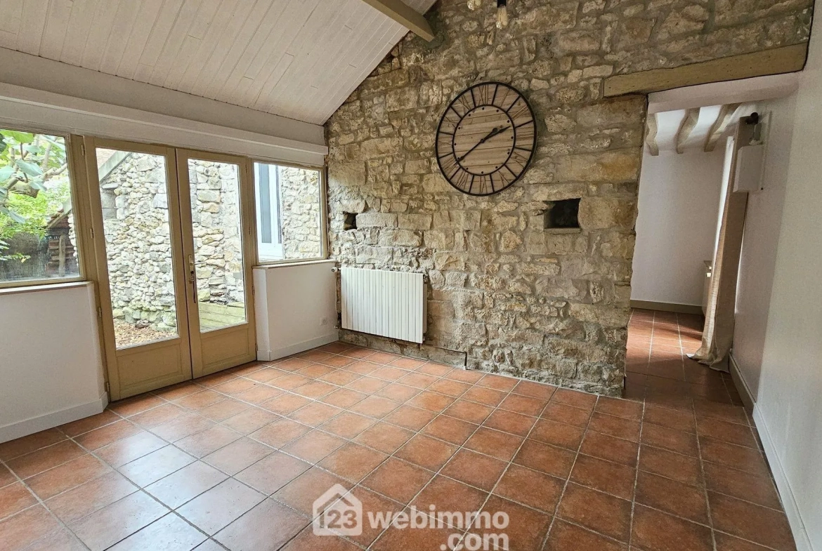 Maison en pierre de 75 m² à Milly-la-Forêt avec terrasse arborée 