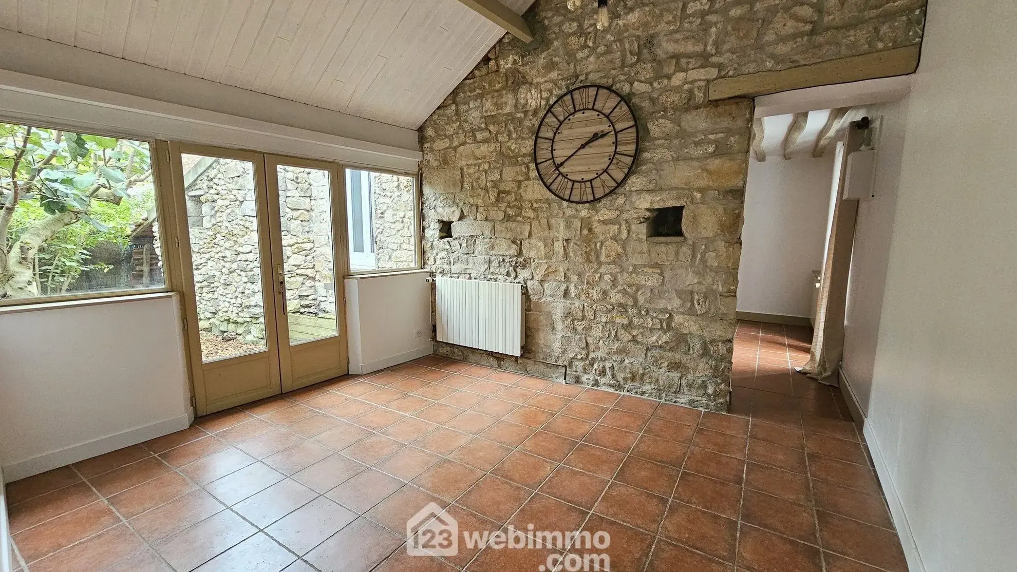 Maison en pierre de 75 m² à Milly-la-Forêt avec terrasse arborée 