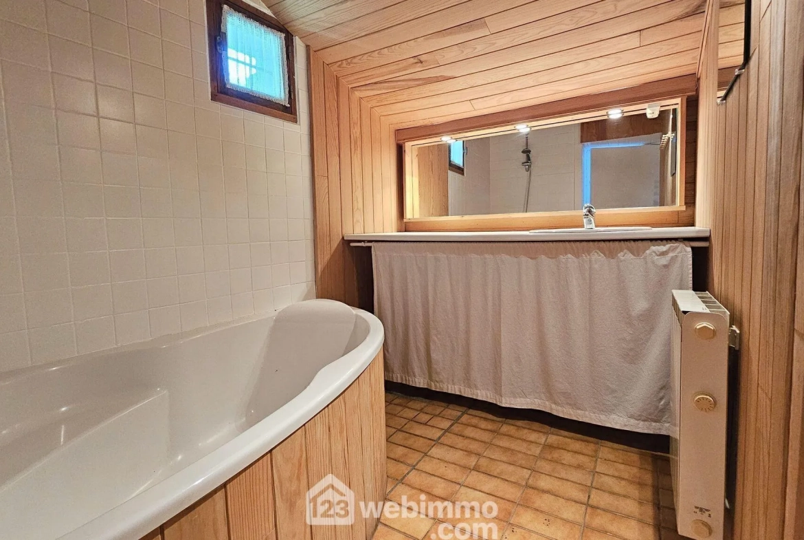 Maison en pierre de 75 m² à Milly-la-Forêt avec terrasse arborée 