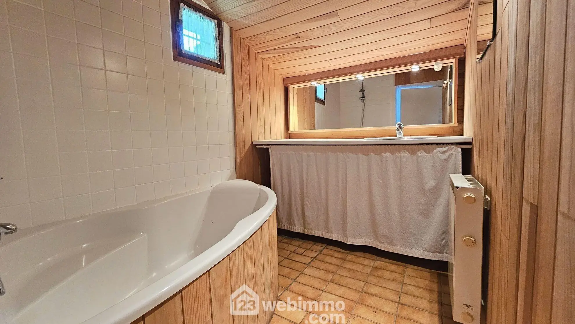 Maison en pierre de 75 m² à Milly-la-Forêt avec terrasse arborée 
