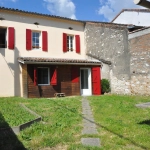Immeuble de rapport à Briatexte avec 4 appartements et local professionnel