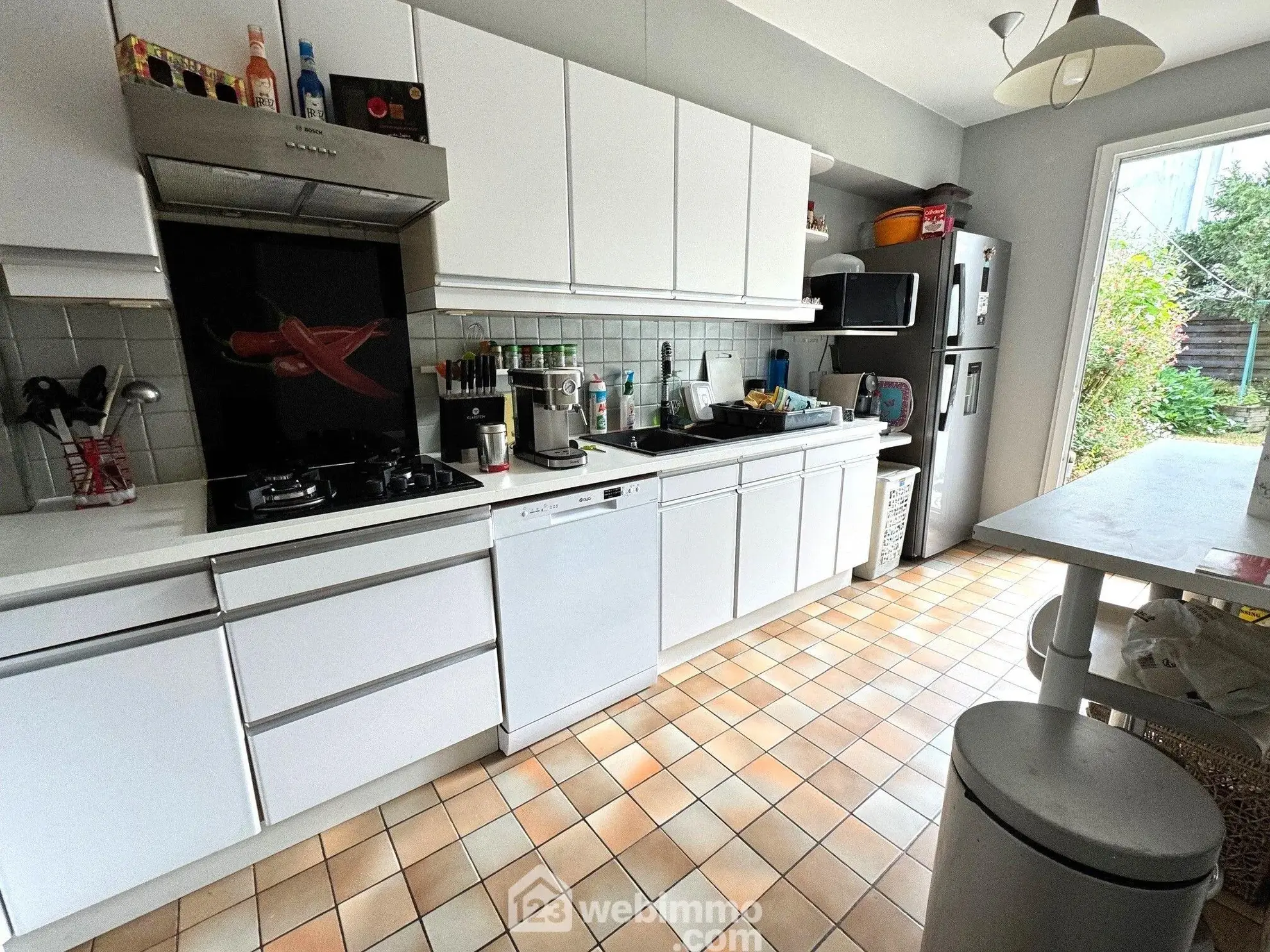 Maison mitoyenne de 88m² à Bondoufle avec jardin et garage 