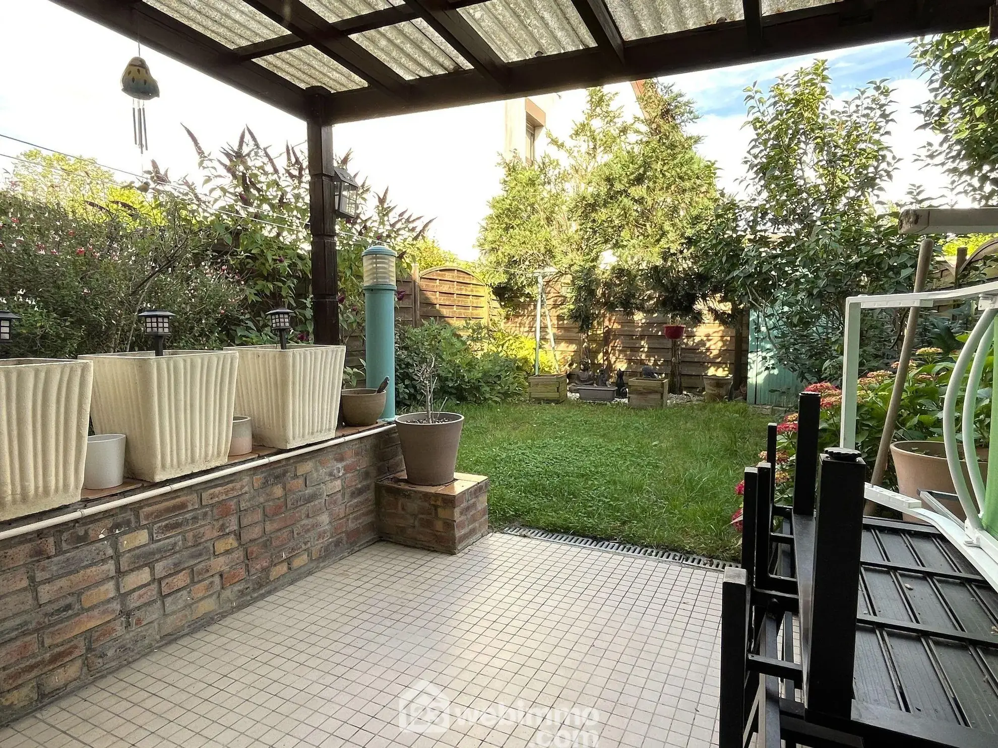 Maison mitoyenne de 88m² à Bondoufle avec jardin et garage 