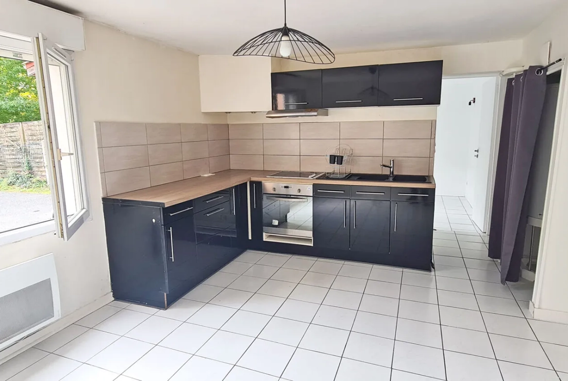 Appartement F2 avec jardin à Bayonne Beyris, double exposition, parking, à proximité des commodités 