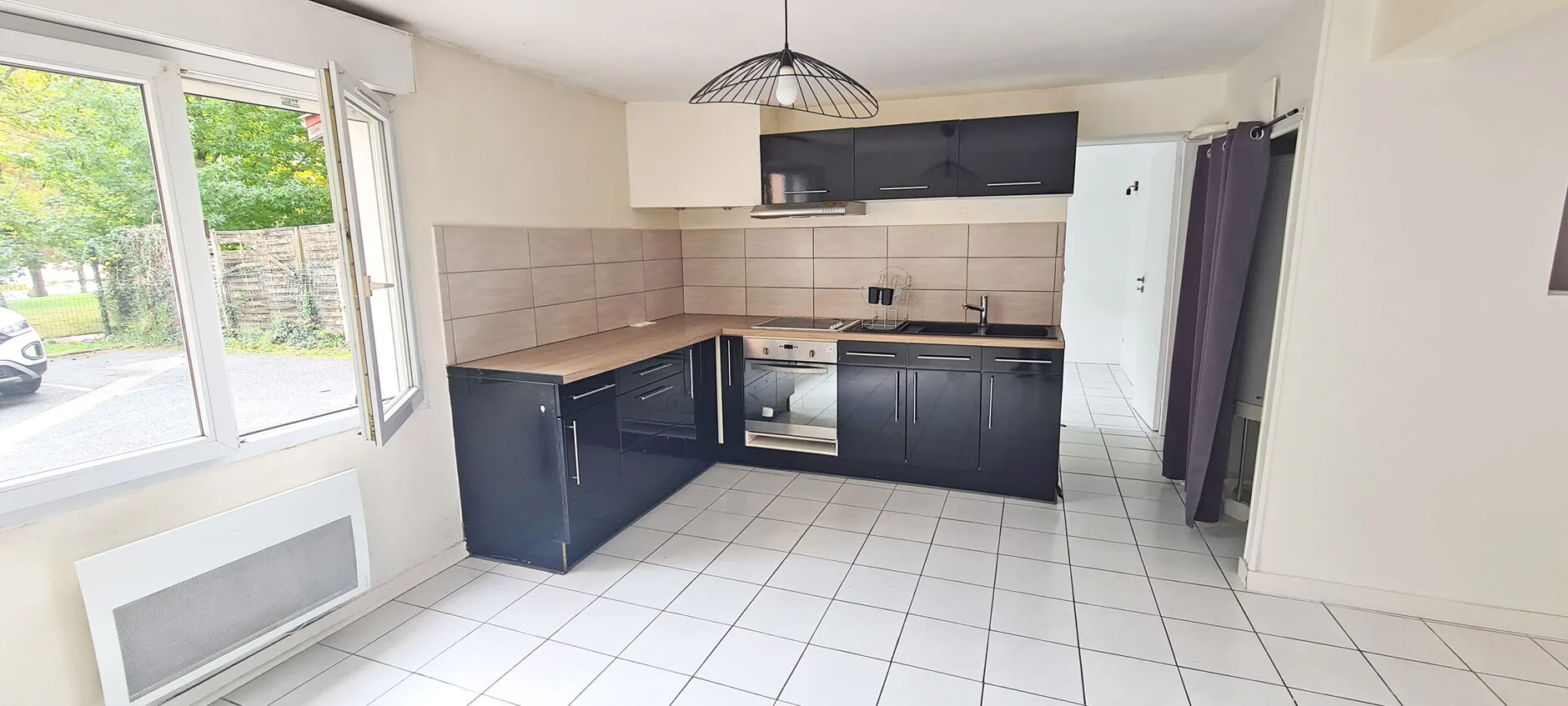 Appartement F2 avec jardin à Bayonne Beyris, double exposition, parking, à proximité des commodités 