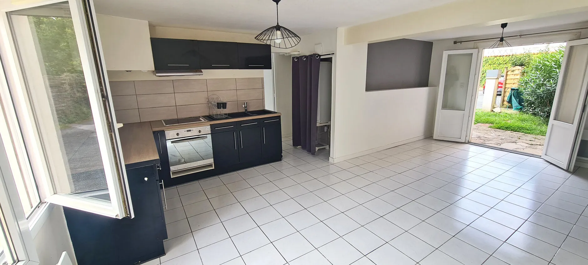 Appartement F2 avec jardin à Bayonne Beyris, double exposition, parking, à proximité des commodités 