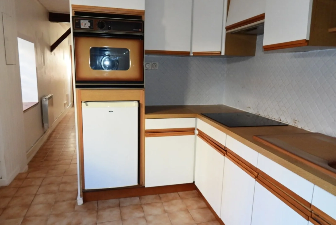 Maison en briques et silex au centre de Fécamp avec 2 chambres 