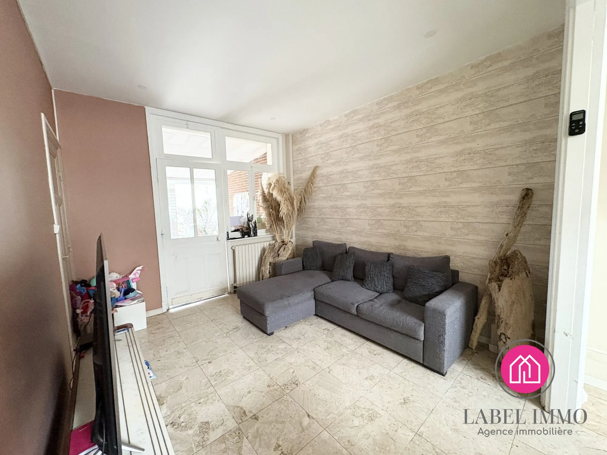 Maison semi-individuelle à Somain avec jardin, 3 chambres, proche commodités 