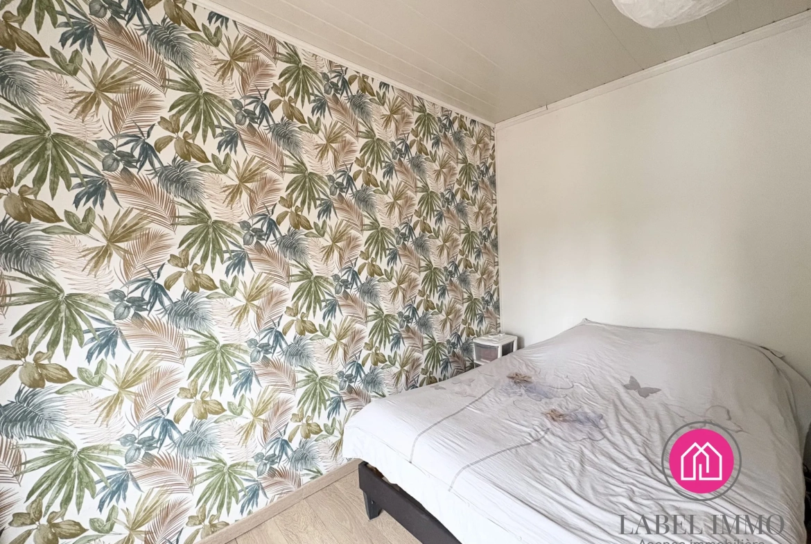 Maison semi-individuelle à Somain avec jardin, 3 chambres, proche commodités 