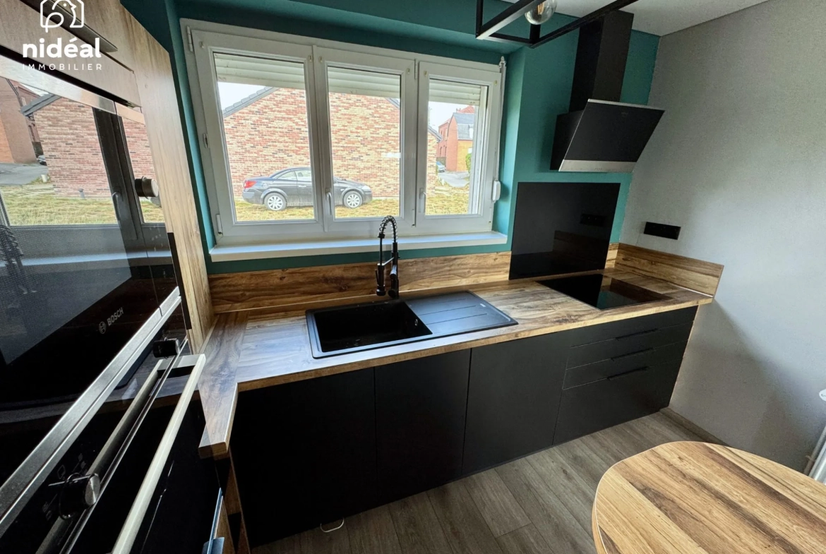 Maison rénovée de 75 m² avec jardin à Ferrière-la-Petite en campagne 