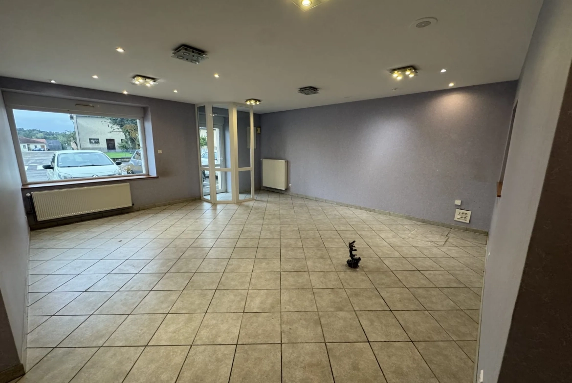 À vendre local commercial de 54m² à Champenoux avec vitrine sur rue 